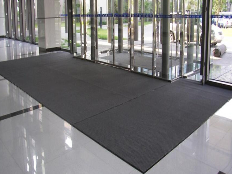 PVC, Rubber, Or Carpet? Choosing The Right Material for Entrance Mats